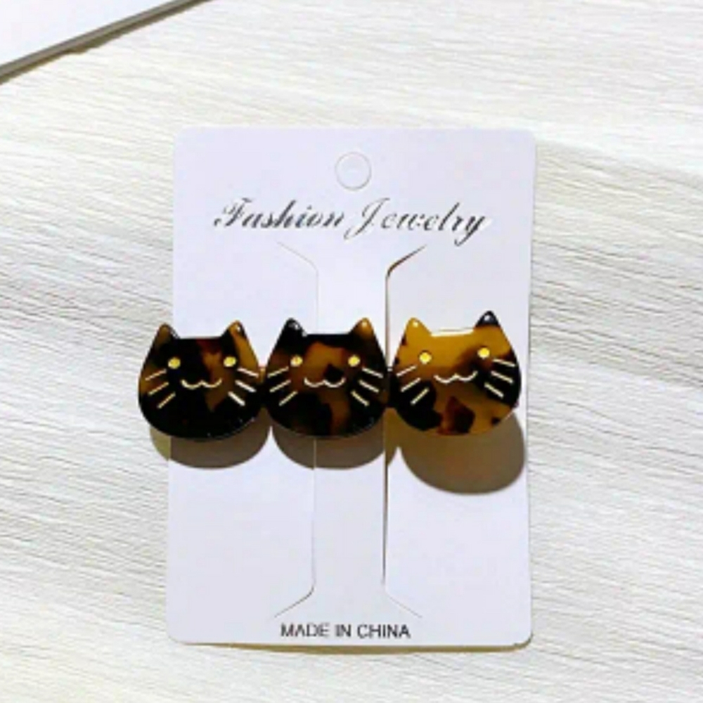 Hair clip, cats face hair clip.